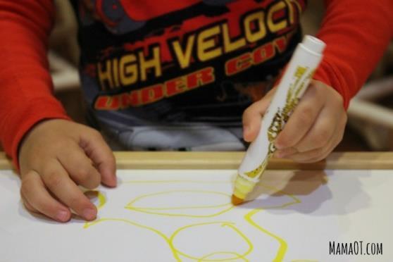 When the Static Tripod is first developing, you may see the wrist flexed (bent forward) and floating above the writing surface, whether the child is working on paper flat on a table or coloring on a