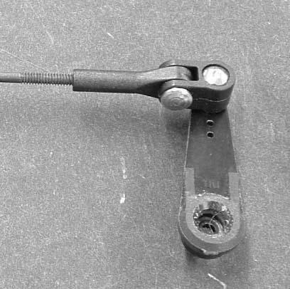 Adjustable horn bracket Pushrod coupler Pivot Pin E Clip 8-32 Nut 8-32 x 3 Hardened Bolt 2. Insert The 4-40 bolt through the servo arm bushing.