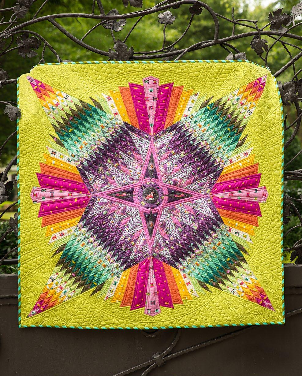 Dreamcatcher Featuring pirit Animal by Tula Pink Try your hand (literally) at piecing this beautiful star medallion showcasing the colorful fabrics of Tula s pirit Animal collection.