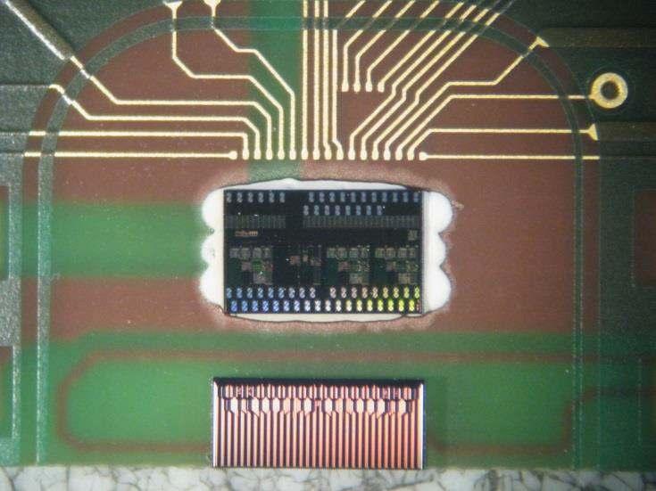 of glue. In figure 3 there is a comparison between the two technologies. The GMR chip at the edge is placed by means of a two in one dicing tape, the ASIC is placed conventionally.