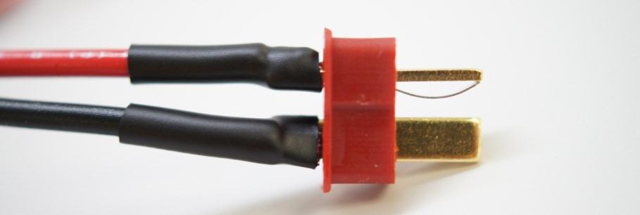 Slide a piece of shrink tubing into each cable but don t shrink it yet.