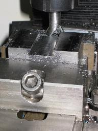 To make a tool-holder I used a piece of mild steel about 28 x 66 x 47 mm, the work was squared in the milling machine and the position of the dovetail was marked