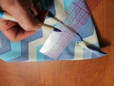 To prepare the inner lining, cut two pieces of the outdoor fabric to 20" x 17 1/2". Align the two fabric pieces together, right sides together.