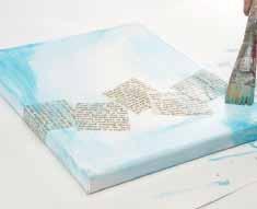 Use gel medium and a palette knife to apply torn pieces of book paper along the bottom third of the canvas.