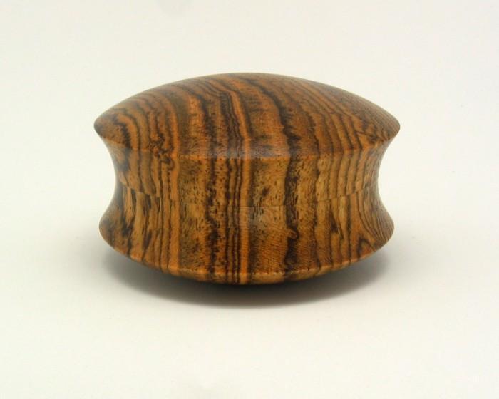 Domed Cove Box Michael G. Stafford I don t know who first turned a box where the sides were curved in to form a waist or as we like to say in woodturning, coved.
