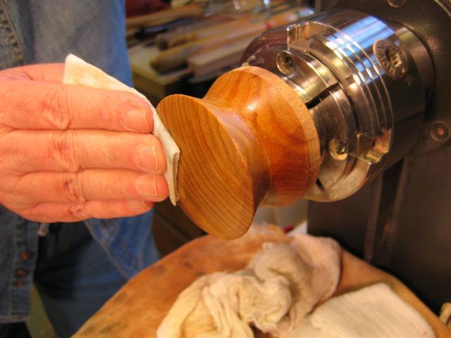 Power sanding at slow speed will help form the smooth curve and finish on the lid.