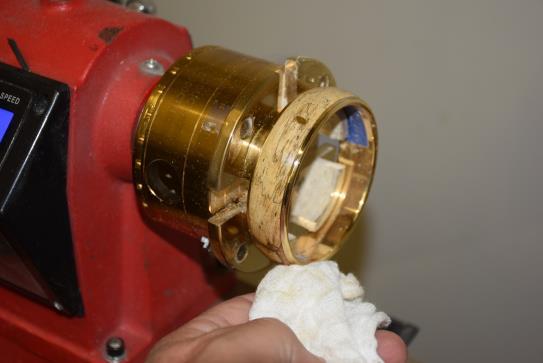 Buffing off the lathe will provide you with excellent results.