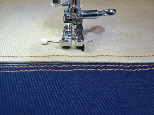 Re-thread the machine with with the contrasting thread in the top and thread to match the split panels in the bobbin. 7.