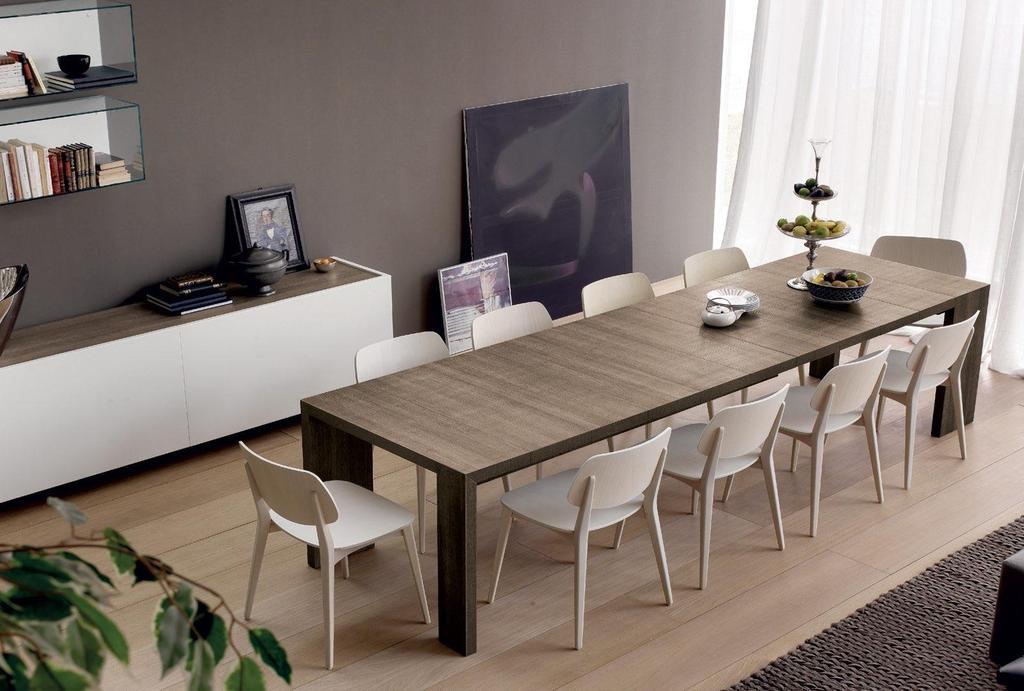 Mod. KONSTANTINE Partner: OLIVIERI Extendable dining table with 4 extensions to seat from 6 to 14 people.