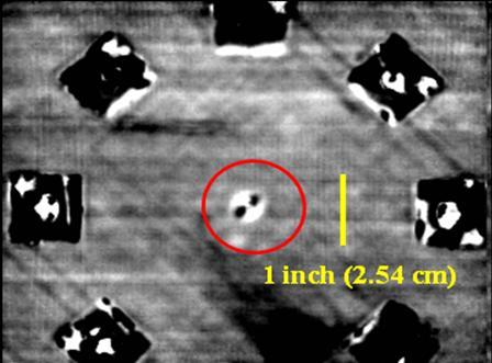(a) Impact surface (b) Back surface Figure 3: Nondestructive thermographic imaging of the composite plate The fourth and final operation involves the application of image filtering tools in order to