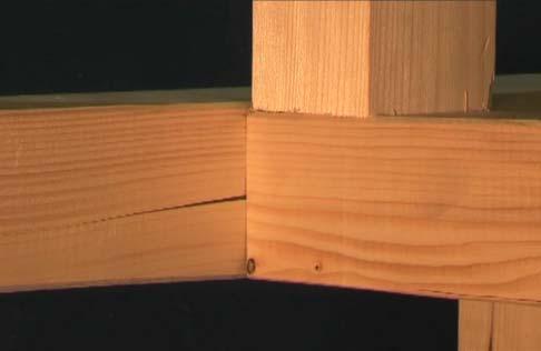 dowel (Failure Mode 1a) can be observed in Figure 21. Figure 19: Detail of Dovetail Connection failing in Tension perpendicular to the Grain in the Main Beam 4.