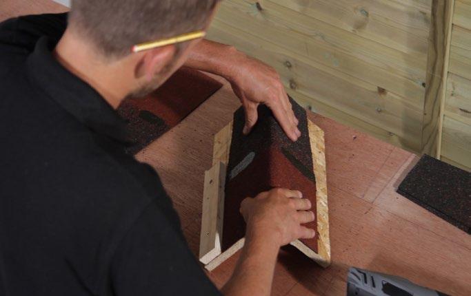 Fabricating ridge tiles On a bench cut the underside of the rectangular shingle
