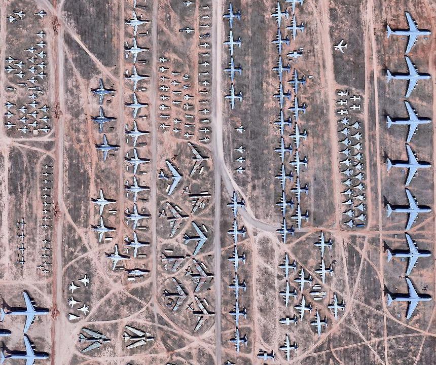 (a) Airplane graveyard (input) (b) Example result (in false color) of thresholding and morphological operations (output) Figure 2: Airplane graveyard. (integer) for each plane that you could detect.