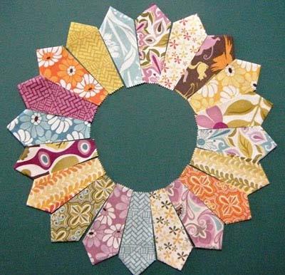 Divide the petals into 2 stacks of 20, evenly distributing colors and patterns. Lay out a set of 20 petals in a pleasing manner.