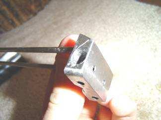 5. Lower Receiver Screw Clearence: Drill two holes of the appropriate size an the end of the lower receiver to