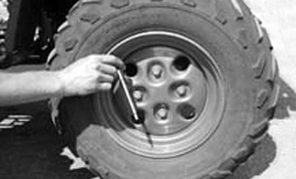 Using an air pressure gauge, measure the air pressure in each tire. Adjust the air pressure as necessary to meet the recommended inflation pressure. INSTALLING 1. Install each wheel on its hub. 2.