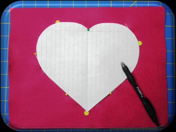 (I cut a heart out of notebook paper, but you can probably Google just about any simple image and adjust its size in your printer s dialog.