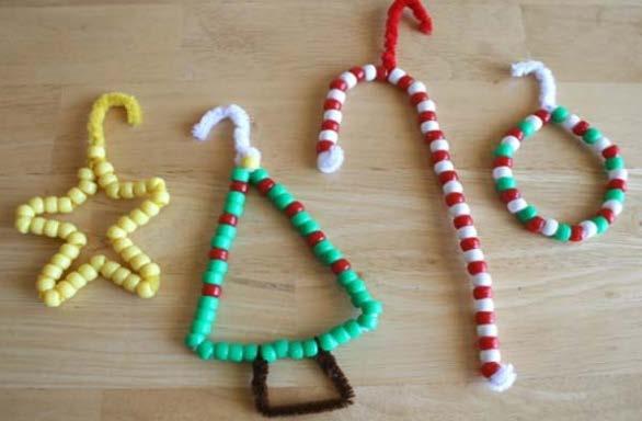 If making a bookmark you are done! 5. If making an ornament, cut 2 of ribbon and glue onto back of stick in a loop shape Pipe cleaner ornament Pipe cleaners Beads 1. Knot 1 end of a pipe cleaner 2.