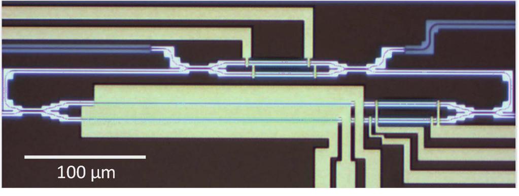 Input Drop port PN diode phase shifters Thermal tuners Through port Normalized transmission (db) 5 1 15 5 Thru Drop 3 1533 1534 1535 1536 1537 Wavelength (nm) (a) (b) Fig. 3. (a) Optical micrograph of the fabricated device.
