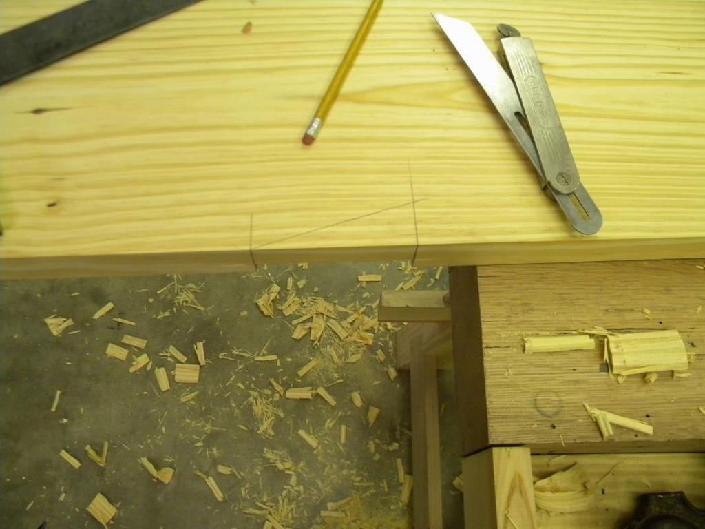 made a saw cut down the center of the waste. Then chopped out the majority of the waste with a chisel and cleaned it up with a rabbet plane.