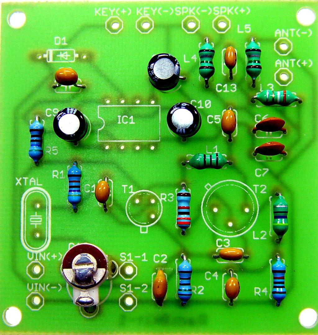The board with the capacitors placed. Give special attention to soldering the electrolytic capacitors C9, C10 and C11 since they are polarized. The correct polarity is printed on the board.