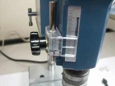 figure 4.1. It requires that the drill cut only partway into the plate. Here we describe a method that uses the stopper of a tabletop drill press to accomplish this. 4.2.1. Height Adjustment of Drill Bit Figure 4.
