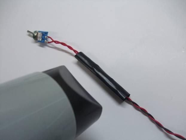 of the black wire. Cut a 70 mm section of heat-shrinkable tubing as shown in the photo.