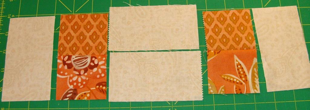 } Sew the triangles together, then join to the squares and rectangle.