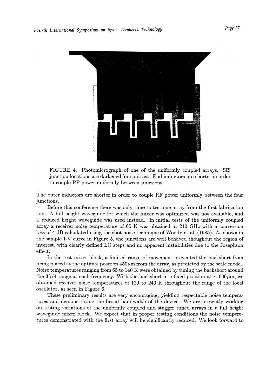 Page 77 FIGURE 4. Photomicrograph of one of the uniformly coupled arrays. SIS junction locations are darkened for contrast.
