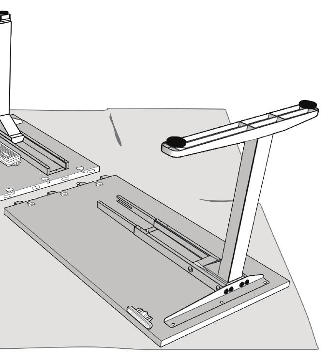 Grasp the Main desk assembly by the frame and desktop (support both, so that you don t stress the screws)