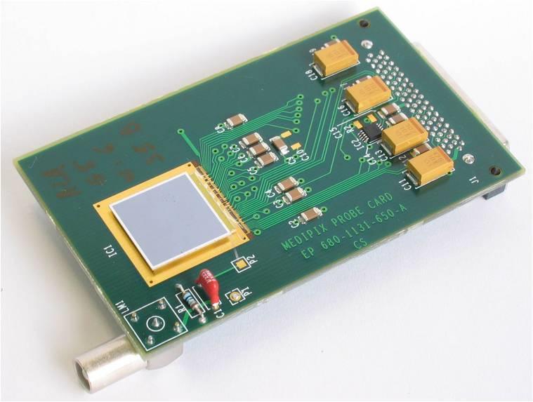 The Timepix chip (Figure 2), developed at CERN, is a device based on Medipix2 chip. It is an hybrid pixel device consisting of 300 µm thick silicon detector chip bump-bonded to a readout chip.