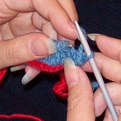 You are ready to start the short rows. Row 1: Knit 23 stitches. Move the working yarn as if to purl and slip the last stitch from the left needle to the right needle. Turn your work.