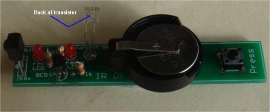 The IR receiver transistor is bent 90 degrees by holding the two