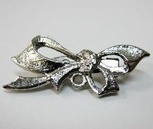 OR SILVER CB012 FANCY BOW BROOCH PRICE: $5.
