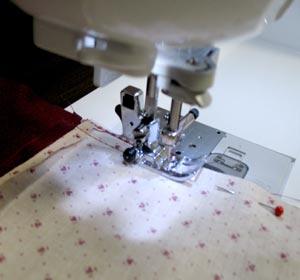 Sew a 1/4 inch seam along the sides only. Press the back seams only.
