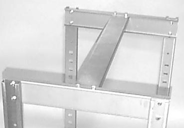 The corner uprights bolt on here, using only the bottom two holes at this time. This step uses 3/8 x 3/4 screws, nuts and washers. 3. Install one upright at each corner.