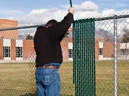 link fencing with HDPE/PVC slats form a privacy and safe guard for