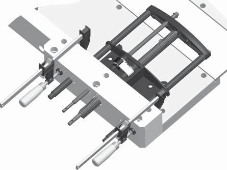 Four mounting holes are required to attach the vise mechanism to the underside of the workbench top.