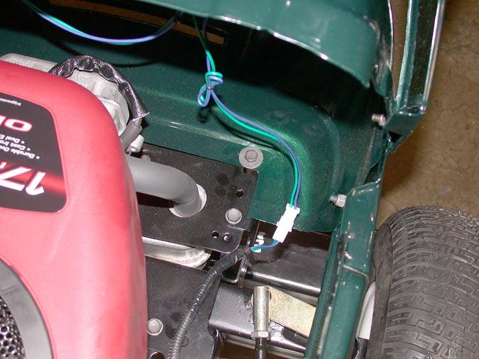 1.5. Disconnect the headlight wiring connector inside the lower right side of the