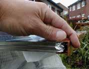 13) Fit the Glazing End Trim to the Glazing. If using Polycarbonate, peel back the protective film to enable the fitting of the End Trim.