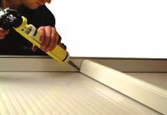Push the sealant nozzle under the lip of the closer and run a continuous line to form a seal onto the roof sheet.