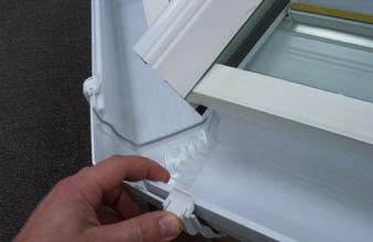 Slide the 'corner fitting' onto the end of the gutter you have just attached with the clip engaged on the rear of