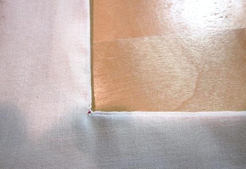 A stitch length option 1. Sometimes, depending on the fabric type or weight, you may need to adjust your stitch length at each corner.