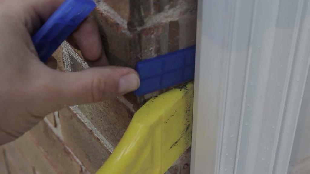 A shield must be used to prevent damage from screwdrivers. 10 11 12 Cover the top of any fixings in the cill with silicone to avoid any water ingress.