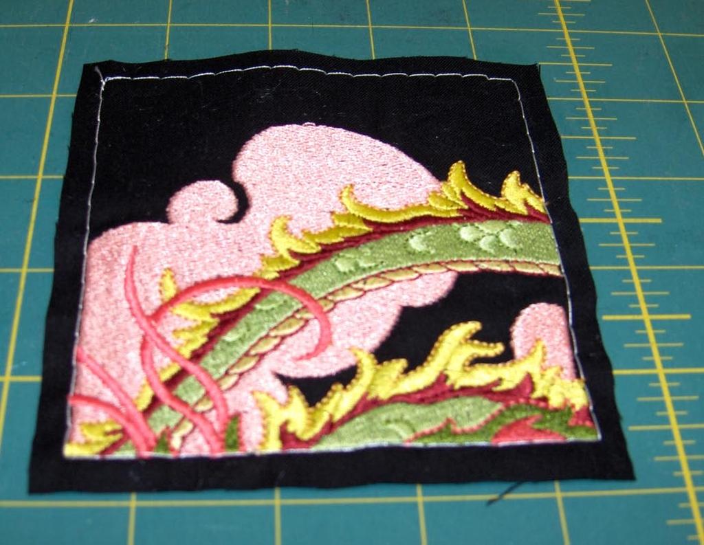 When choosing the color for this outline stitch keep in mind that you want it to blend in with your background fabric but it should also be able to be seen.