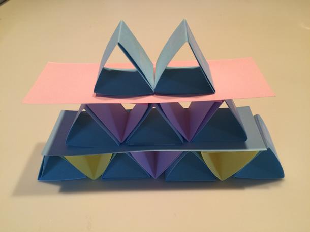 Triangle Block Building 5. Fold the ends of each strip toward the center to create thirds. 6.