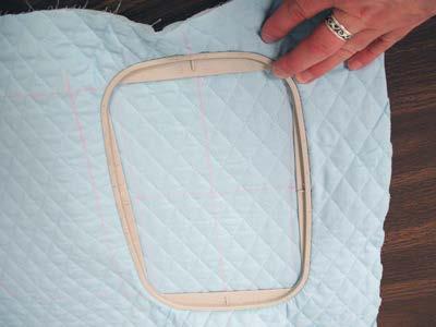 Spray a piece of medium weight cutaway stabilizer with temporary spray adhesive and smooth the fabric on top.