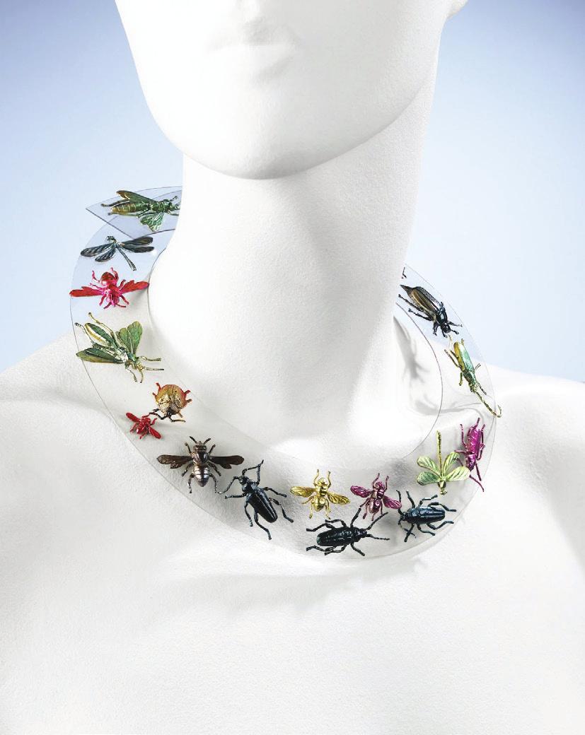 Image for Question 5 Necklace (1938) by Elsa Schiaparelli Materials: Rhodoid and painted metal (Rhodoid was a new plastic material