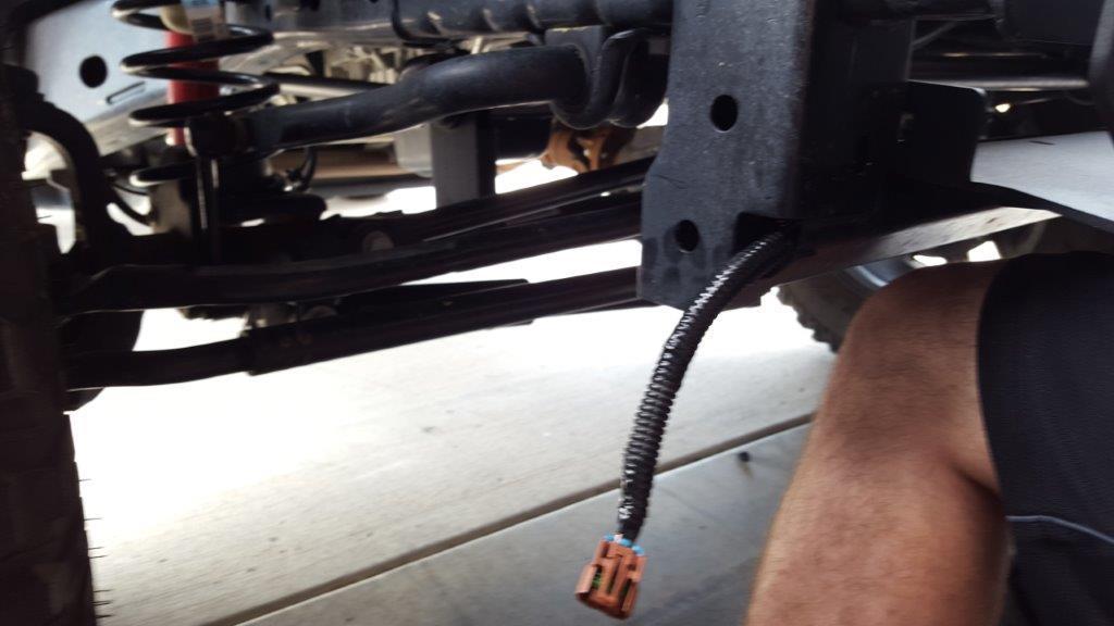 Do so by using 4 bolts through the bolt holes in the winch plate.