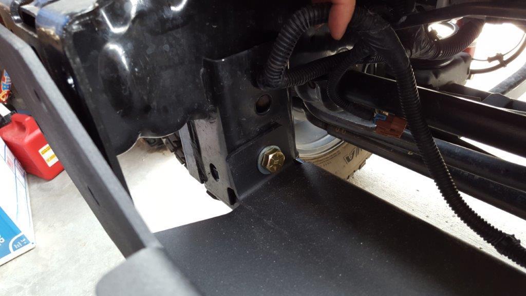 30. I also recommend installing 1 bolt on each side of the front of the winch plate to hold it in place while